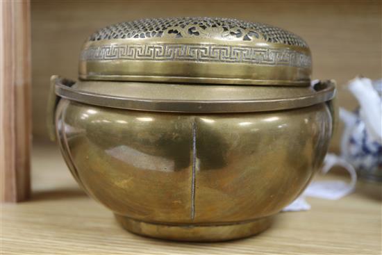 A 19th century Chinese bronze hand warmer